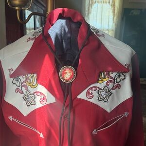 Bolo tie featuring Marine Veteran coin.